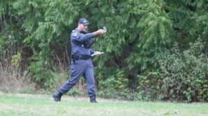 COBOURG -- Stephen Hockley, a member of the Ontario Community Emergency Assistance Program search-and-rescue team, uses a compass to navigate inside Cobourg's James Cockburn Park during a training exercise on Sept. 17, 2016.